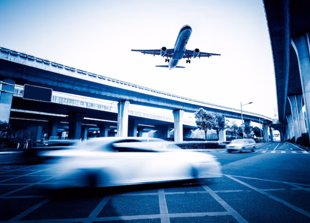 blurred-street-scene-city-with-plane-flying_1359-236