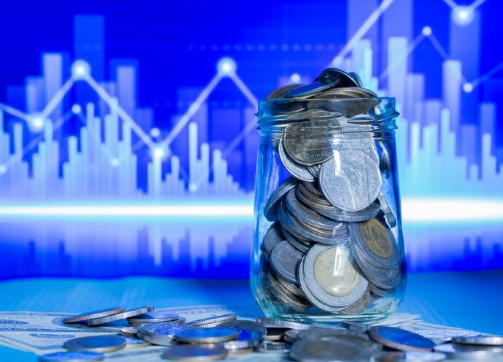 close-up-coins-bottle_1150-17750